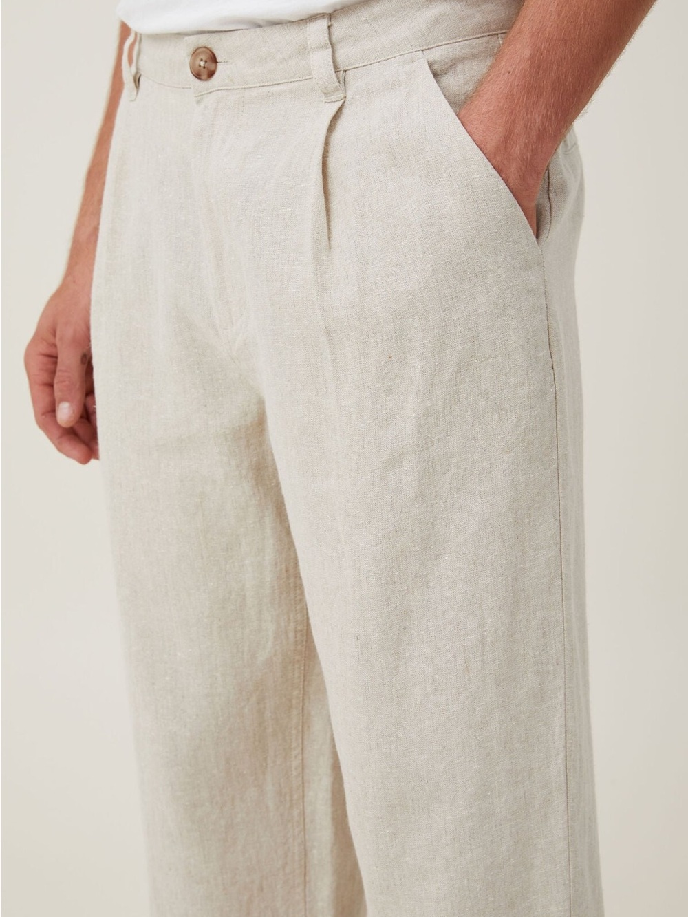 Cotton On Men’s Flat Front Pleated pants in Light Beige
